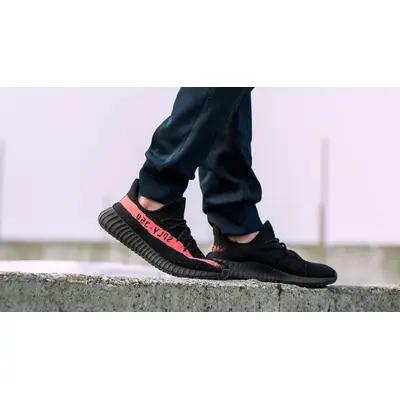 Yeezy Boost 350 V2 Black Red BY9612 on foot