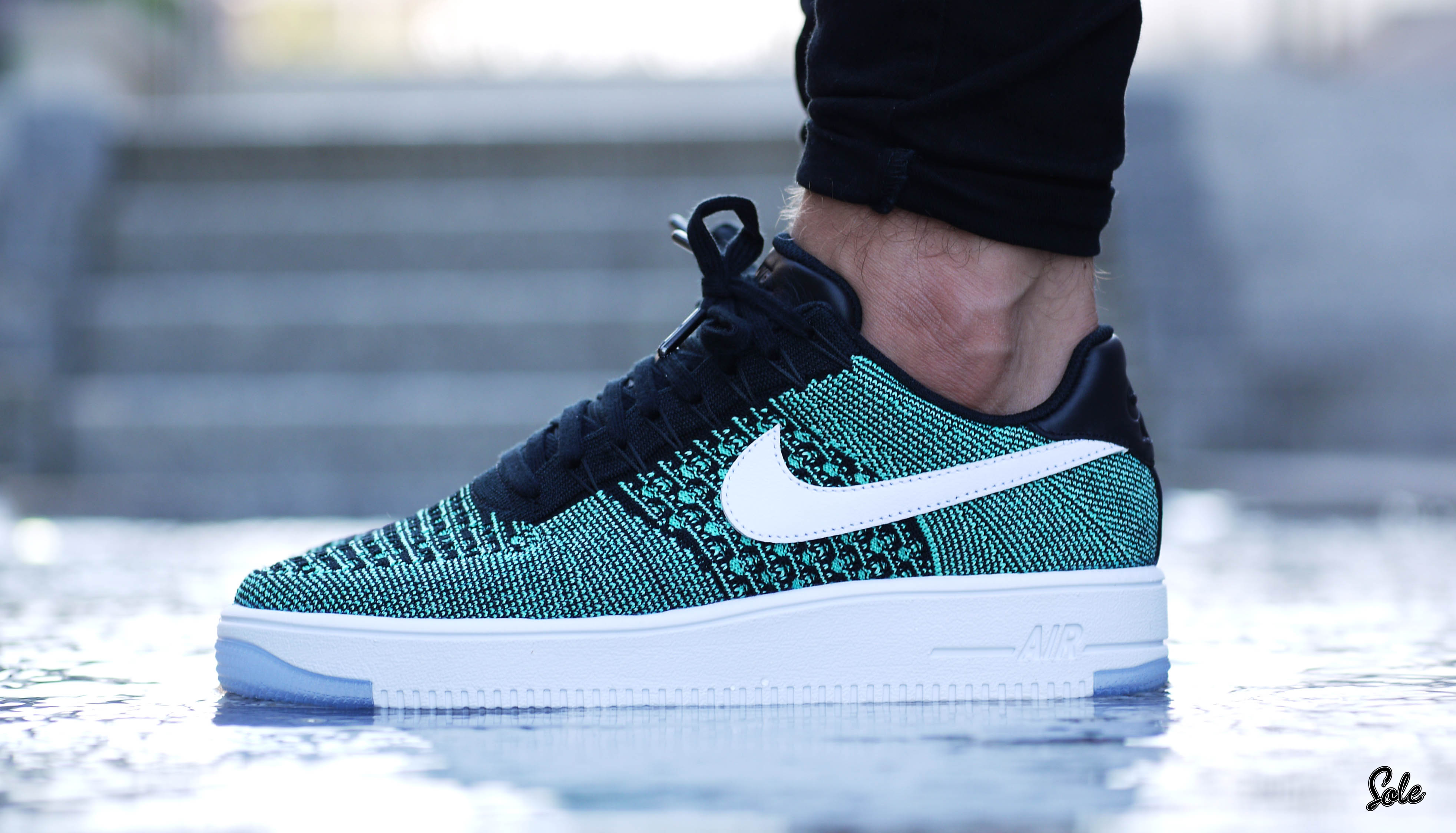 black and turquoise air force ones