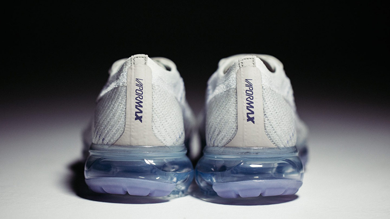 white vapormax with blue bottom