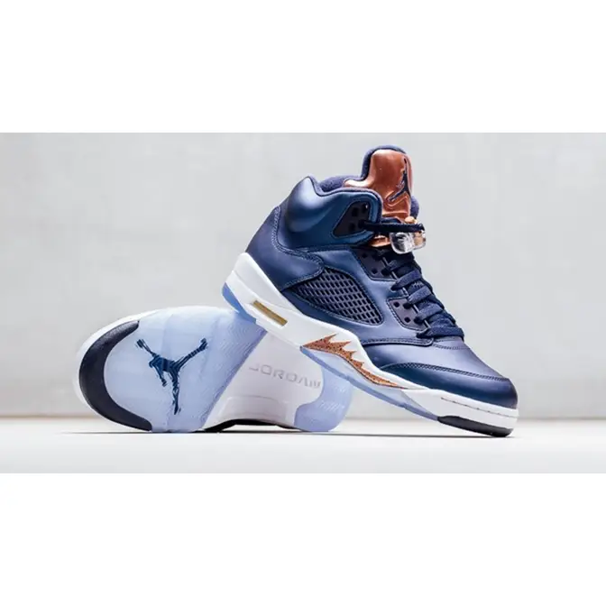 Blue and bronze store jordan 5