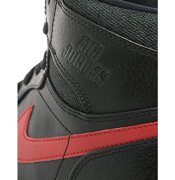 black jordan 1 with red swoosh