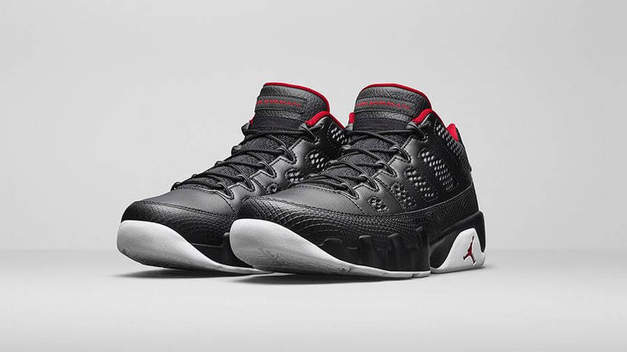 white and black air jordan 9