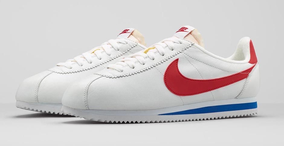 white nike cortez with red swoosh