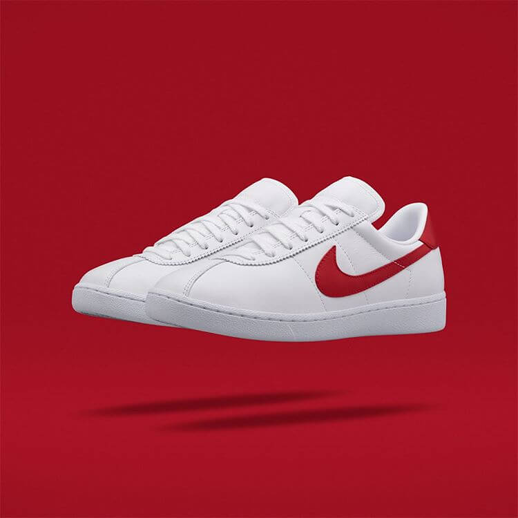nike white trainers with red tick