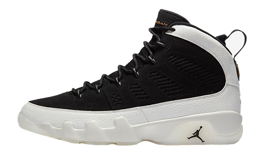 white and black air jordan 9