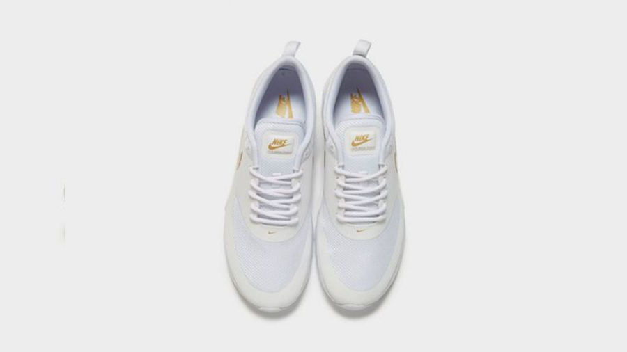 white  and  gold air max thea trainers