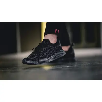 Nmd r1 primeknit stlt 2025 triple black on feet