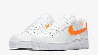 white nike orange tick