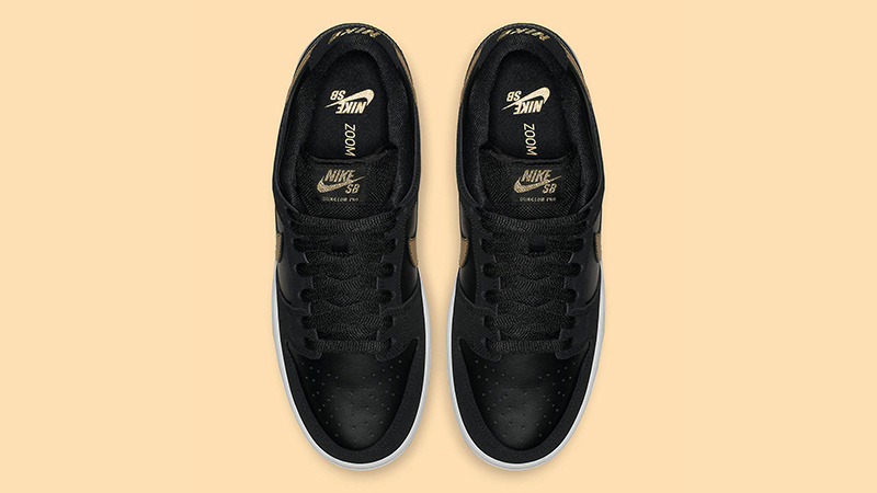 nike sb dunk black gold