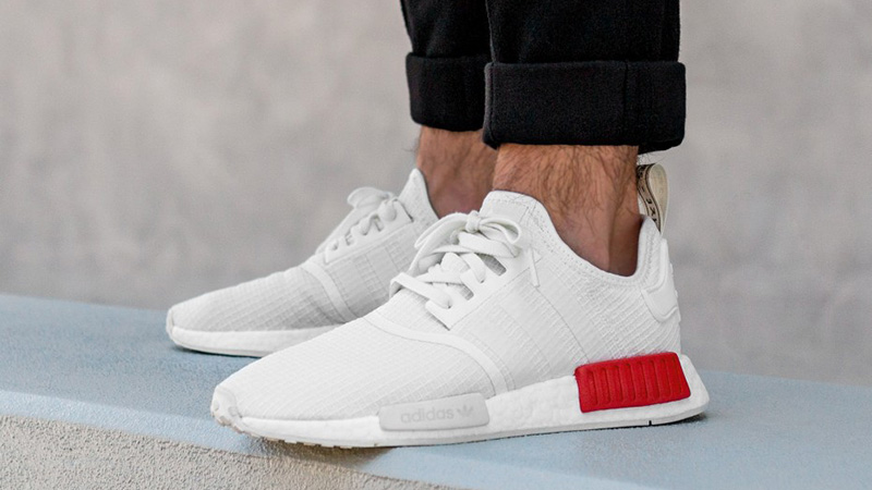 white nmd with red