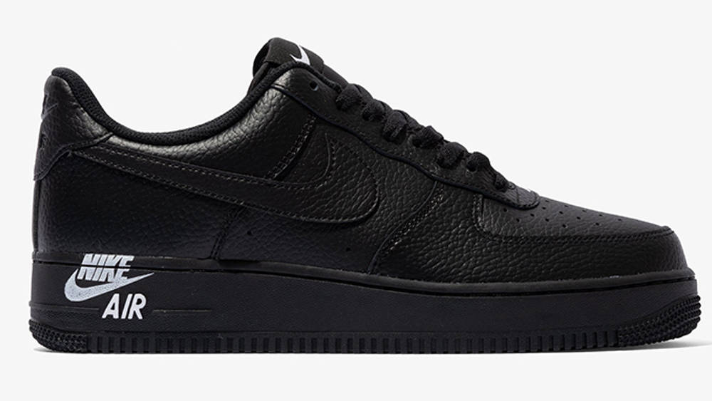 The Nike Air Force 1 Stamp Logo Follows With A Triple Black