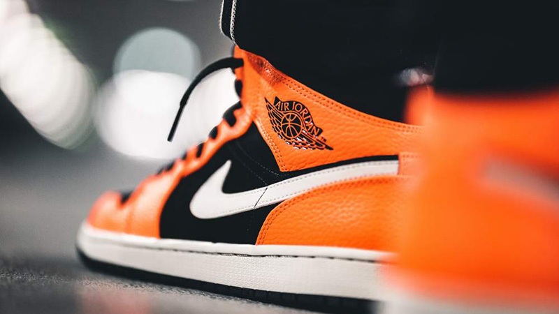 Jordan 1 Mid Black Orange