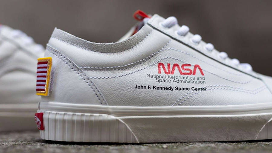 space voyager white vans