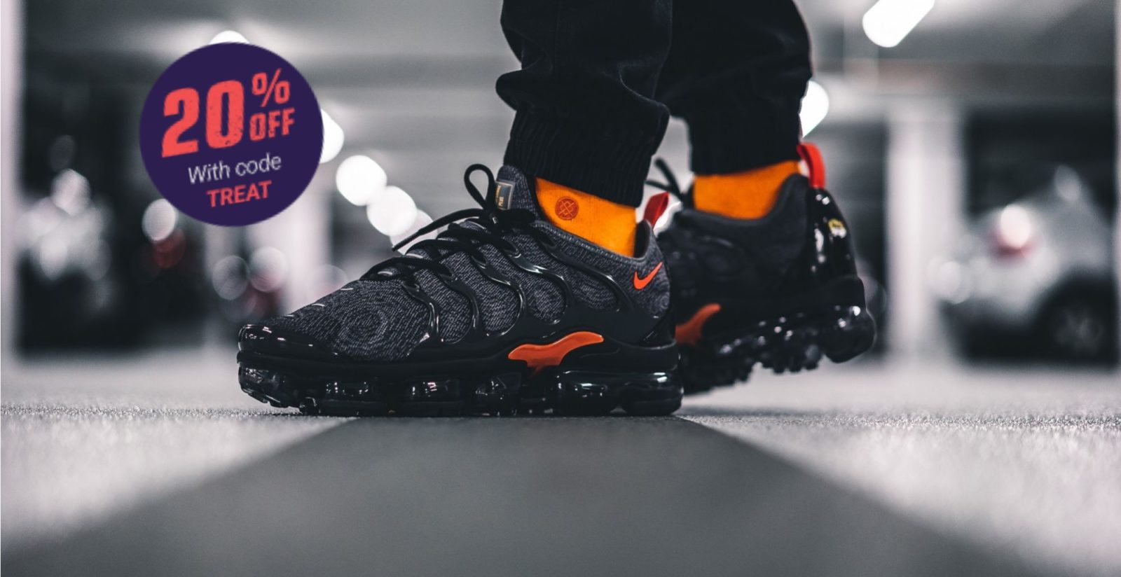 nike grey and orange trainers