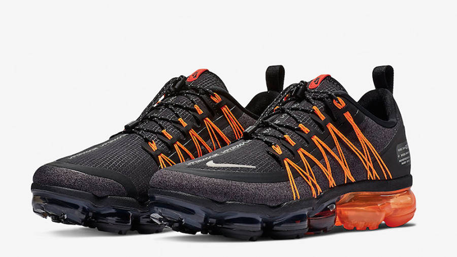 grey and orange vapormax utility