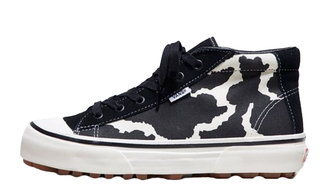 Vans style 29 mid store dx cow print trainers