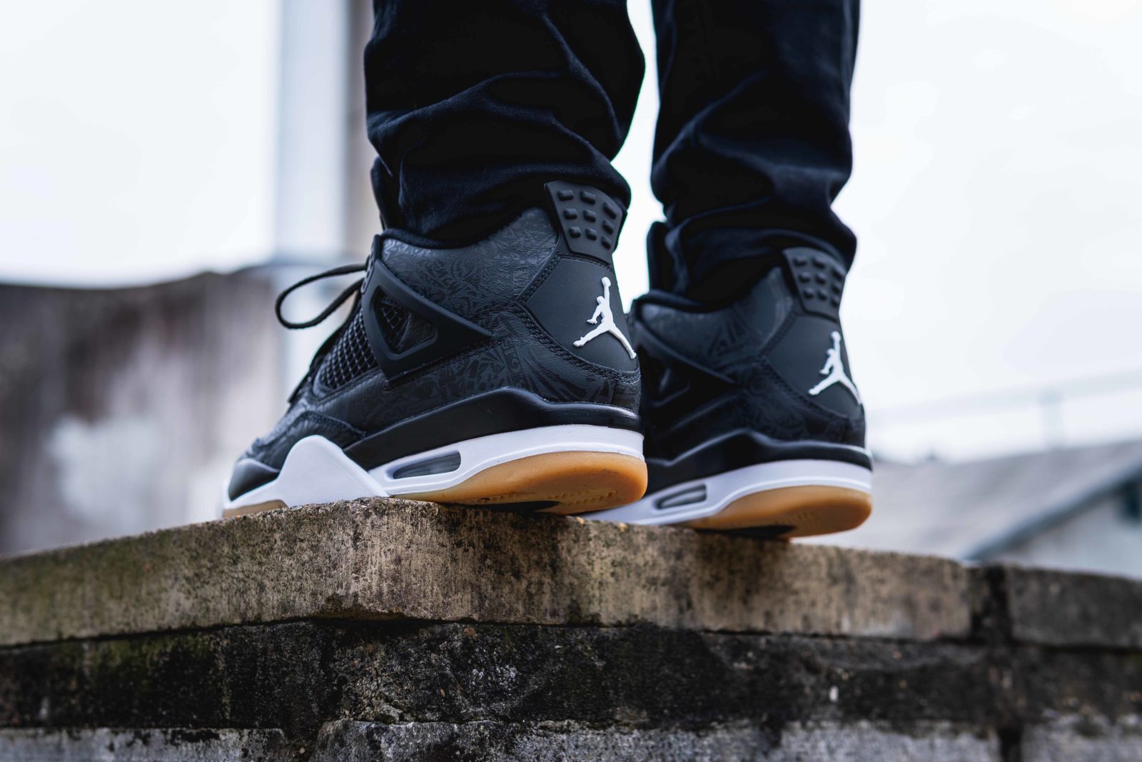 aj4 black laser