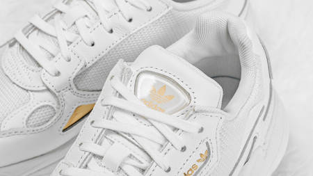 adidas' Triple White Falcon Gets Dipped In Gold adidas' Triple White Falcon Gets Dipped In Gold