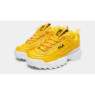 Fila yellow disruptor ii premium hot sale repeat trainers