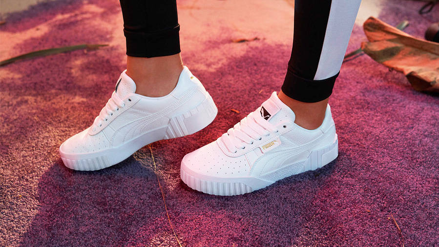 Puma cali on sale triple white sneakers