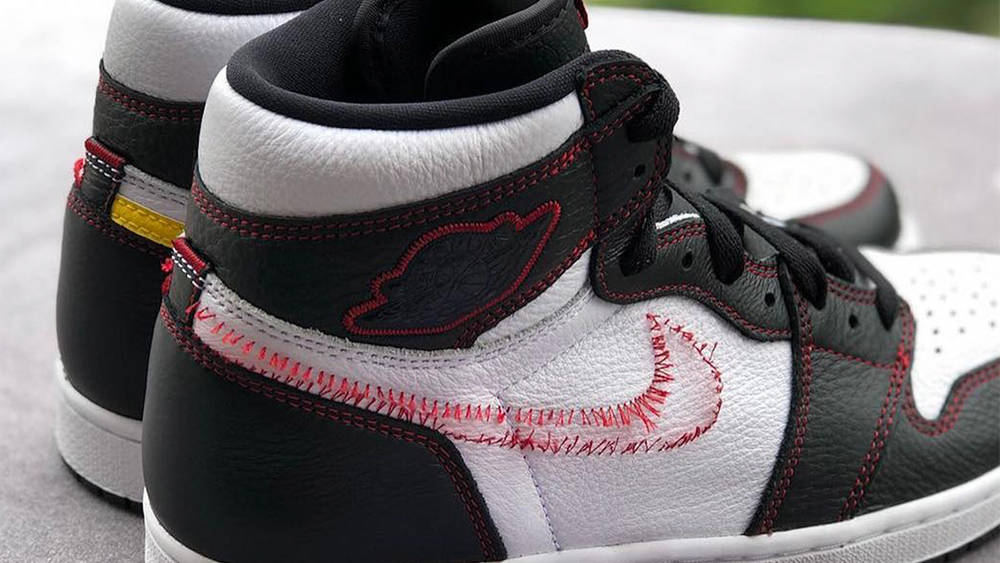 The Swoosh Disappears For The Air Jordan 1 'Dynamic Yellow' The Swoosh Disappears For The Air Jordan 1 ‘Dynamic Yellow’