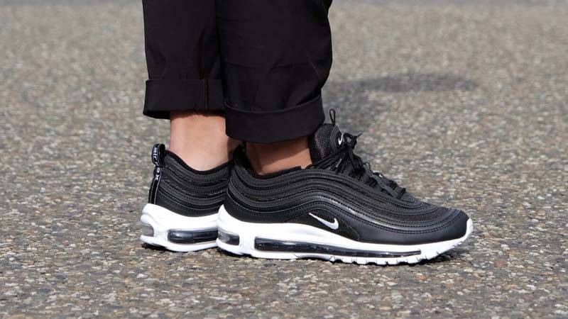 air max 97 black and white on feet