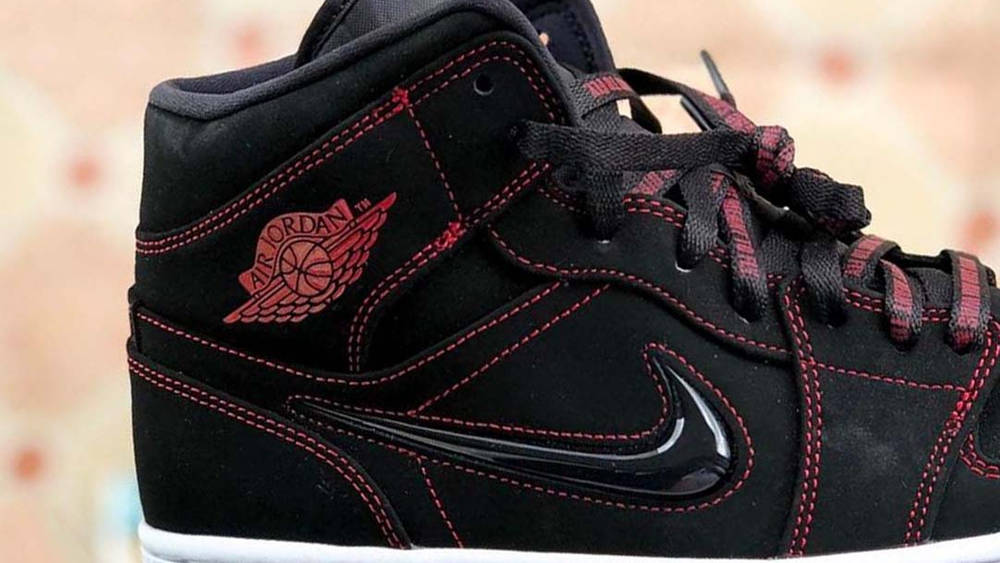 The Air Jordan 1 'Fearless' Surfaces In A Blacked Out Colourway The Air Jordan 1 Mid ‘Fearless’ Surfaces In A Blacked Out Colourway