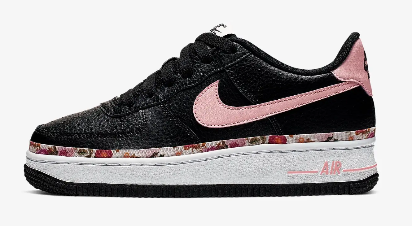 Black nikes hotsell with floral swoosh