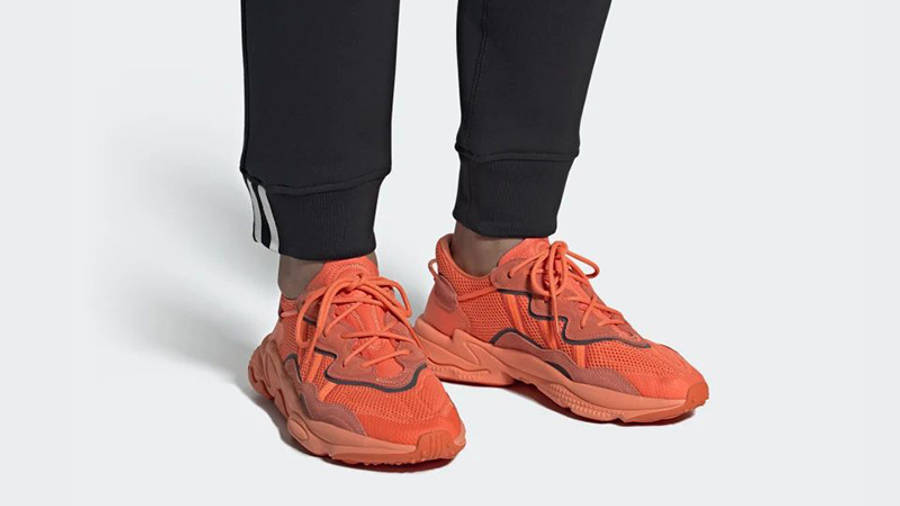 orange sneakers ozweego