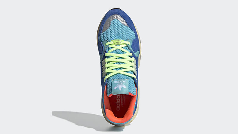 an Adidas ZX Torsion Bright Cyan Linen Green Blue EE4787