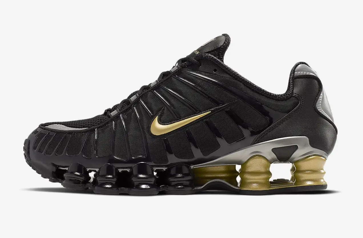 Nike shox metallic gold sale