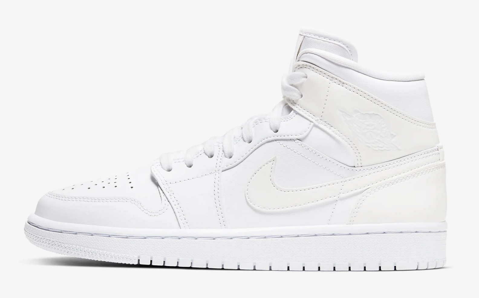 This Triple White Air Jordan 1 Mid On Nike Is One For The Minimalists