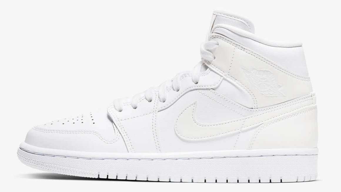 Step Out In Style In This Triple White Air Jordan 1 Mid | The Sole Supplier