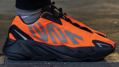 orange black yeezy 700