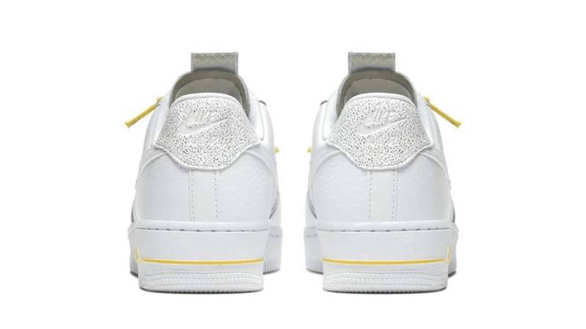 white and yellow air force 1