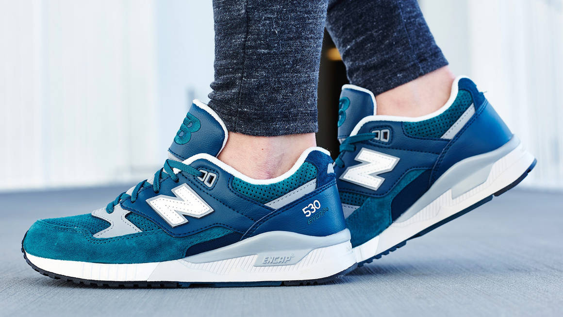 new balance 530 green & white suede trainers