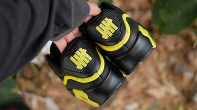 UNDEFEATED x Nike Air Max 90 Black Yellow CJ7197-001 back on hand