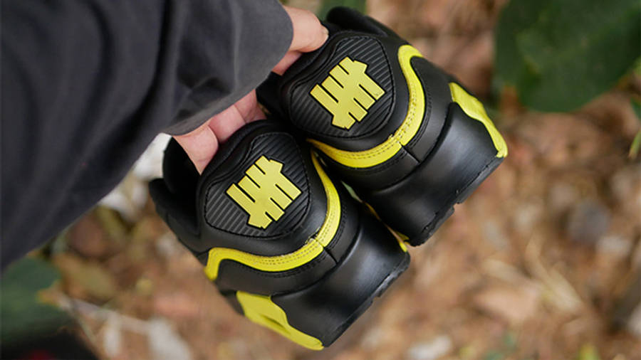 UNDEFEATED x Nike Air Max 90 Black Yellow CJ7197-001 back on hand