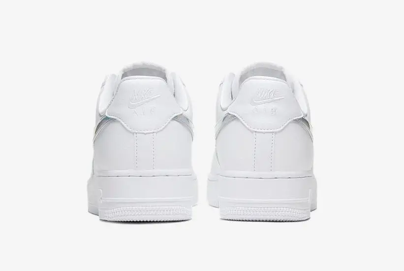 Two New Nike Air Force 1's Get Iridescent Swooshes In White And Pink ...