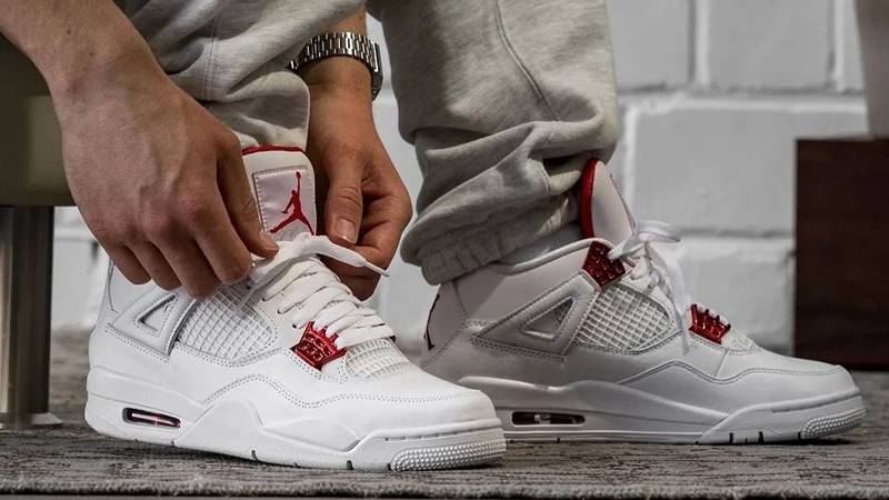 jordan 4 metallic red on feet