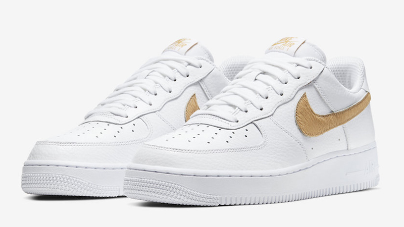 brown and white air force ones