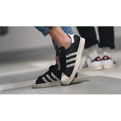 Human Made x adidas Superstar Black White on foot front