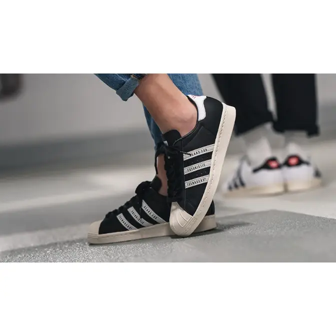 Human Made x adidas Superstar Black White on foot front