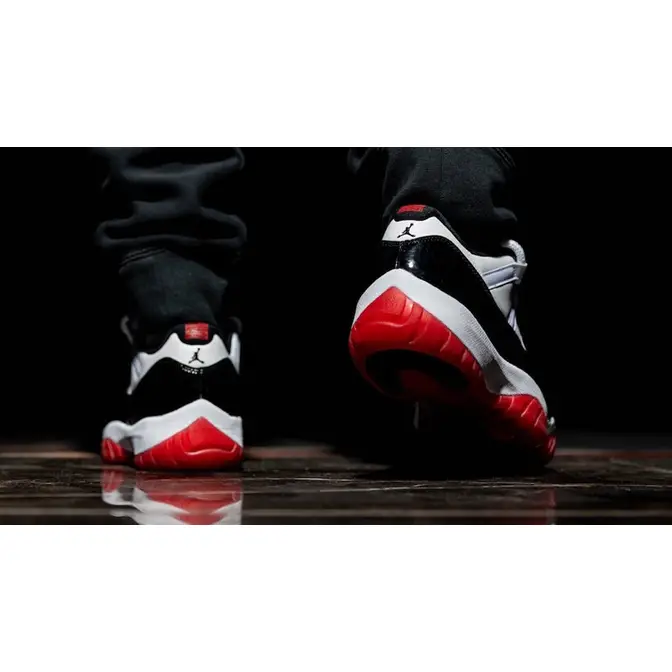 Black and red store jordan 11 concord