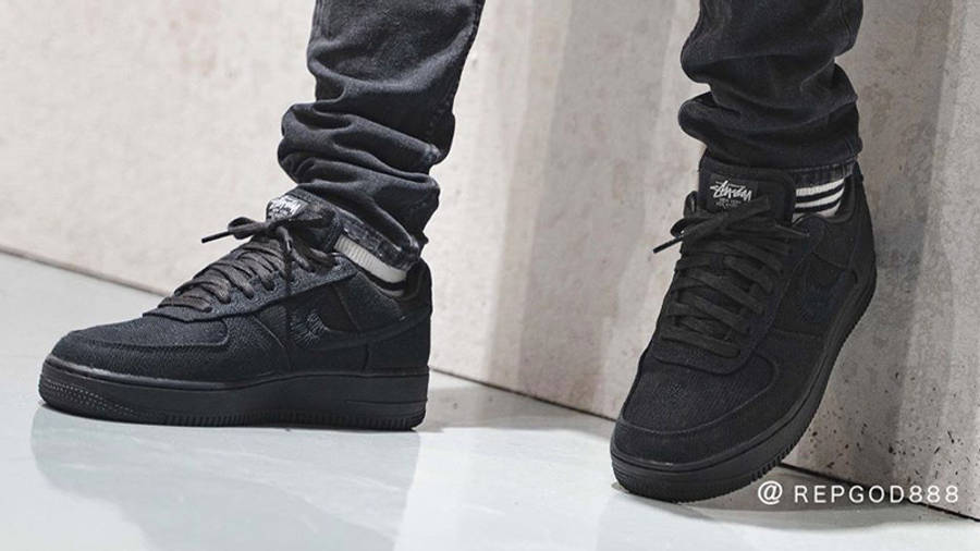 all black air force ones on feet