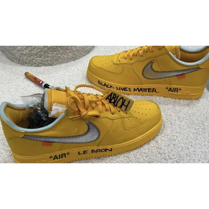 More Images of The Off-White x Nike Air Force 1 Low University Gold •