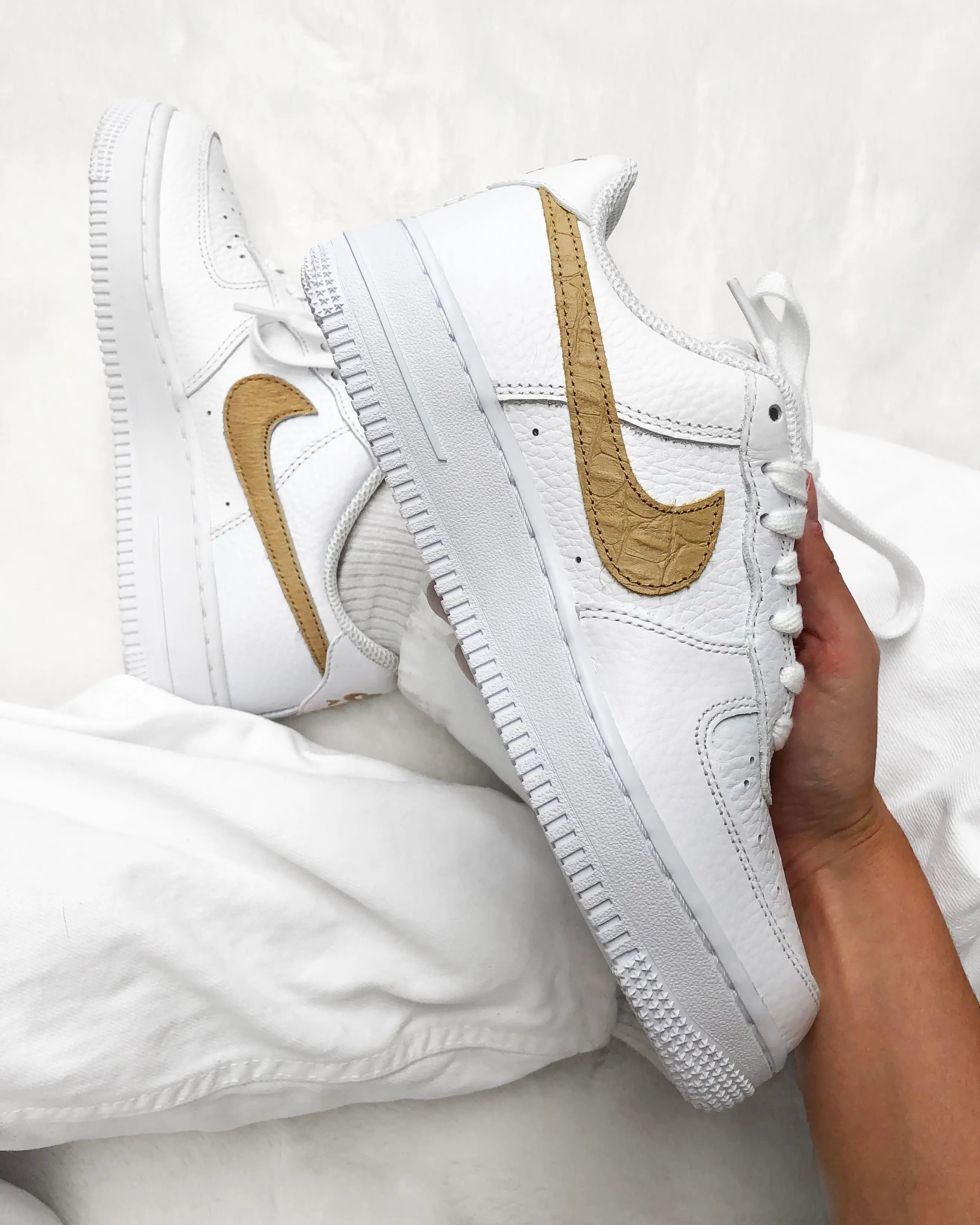 Peep The Unique Mismatched Swooshes On This Nike Air Force 1 Club Gold ...