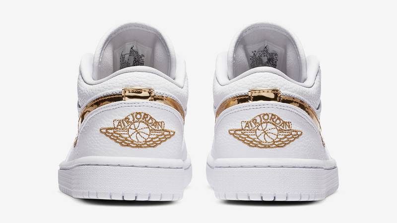 jordan 1 low metallic gold on feet