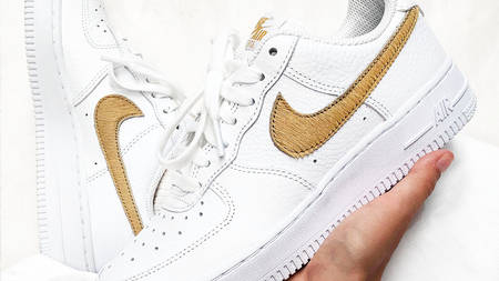 Peep The Unique Mismatched Swooshes On This Nike Air Force 1 Club Gold Peep The Unique Mismatched Swooshes On This Nike Air Force 1 Club Gold