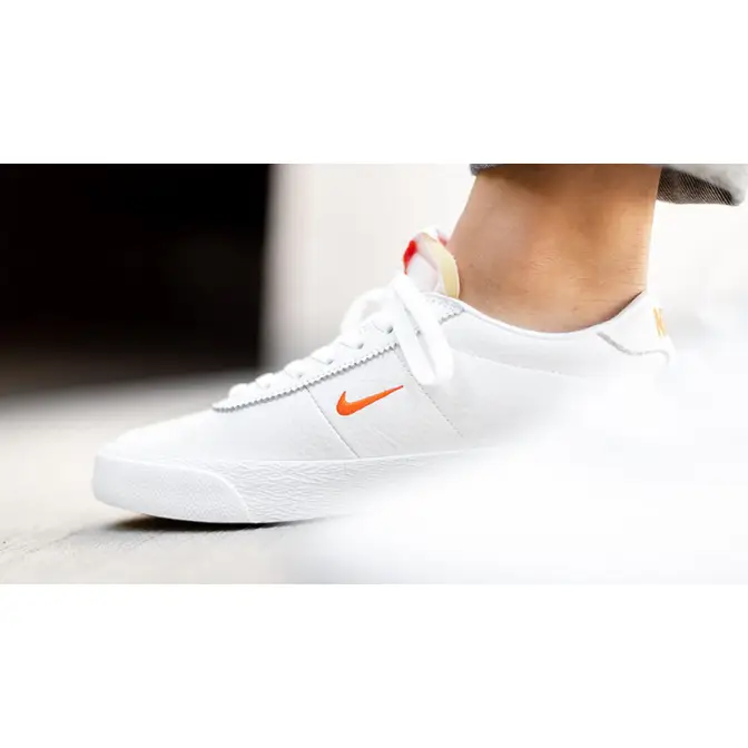 Nike SB Zoom Bruin White Orange AQ7941-101 on foot close up